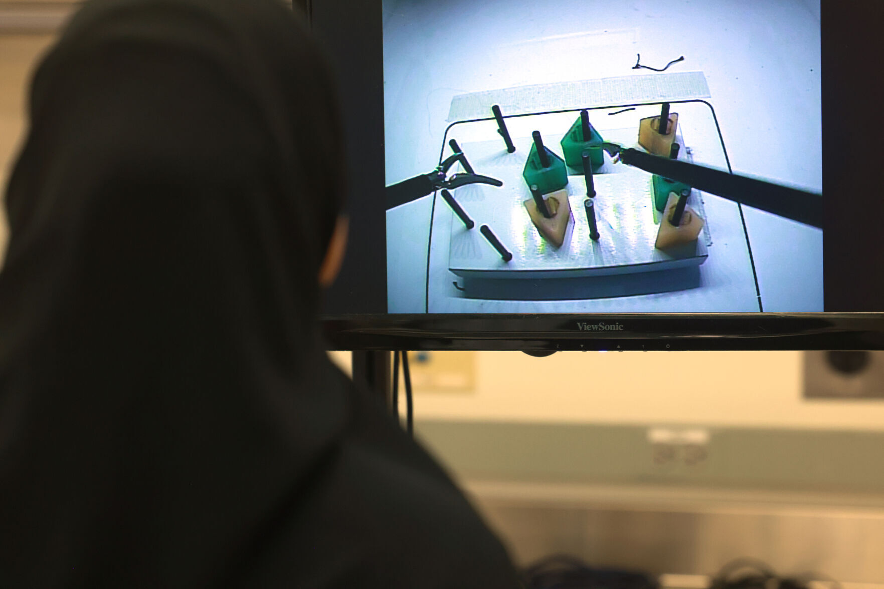 Under a Northwestern program called ChicagoCHEC,, undergrads and recent graduates who are interested in medical school, take part in a demonstration of fundamental laparoscopic surgery, and a tour at a Northwestern surgical bio skills simulation lab, in Chicago, Monday, July 21, 2025.